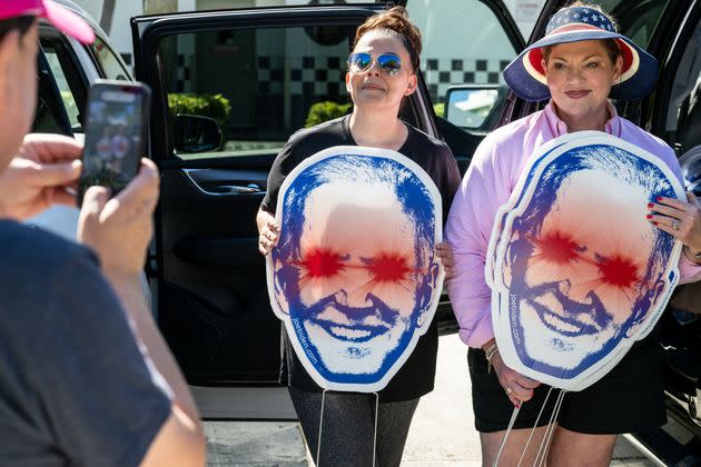 Supporters of President Joe Biden display 