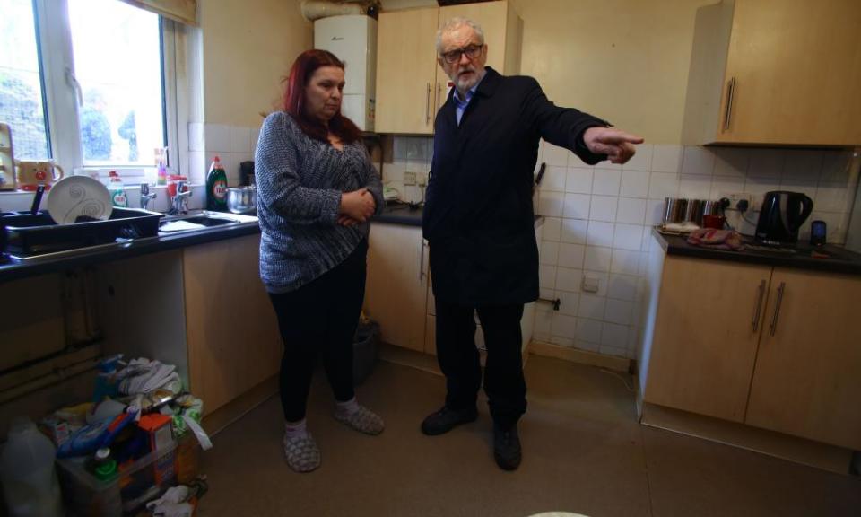 Jeremy Corbyn meets Theresa Davies, who has been affected by flooding, in Rhydyfelin village, south Wales.