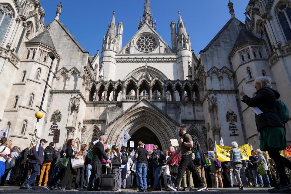 People attend a protest outside the High Court on the day of an extradition hearing of WikiLeaks founder Julian Assange, in London, Britain, on May 20, 2024.