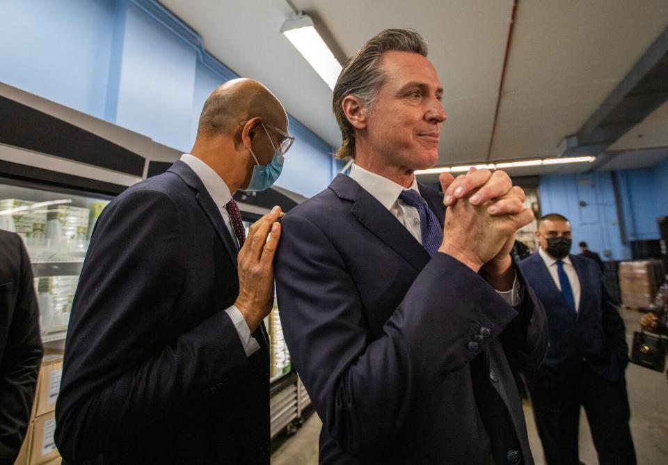 Mark Ghaly, left, with Gov. Newsom