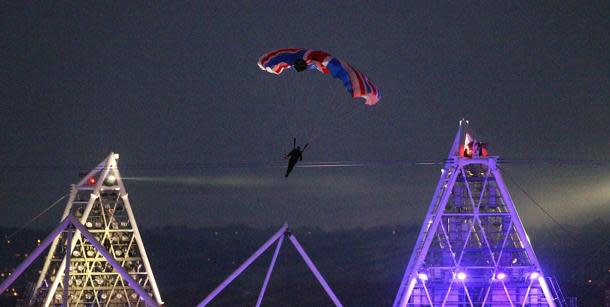 Mark Sutton descending during the London Olympic Opening Ceremony. (AP Photo)