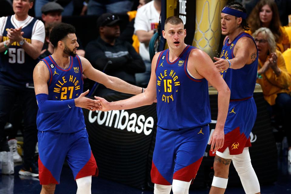 Nikola Jokic (15) and guard Jamal Murray (27) led the way as the Nuggets won Game 1 of the NBA Finals vs. the Miami Heat.