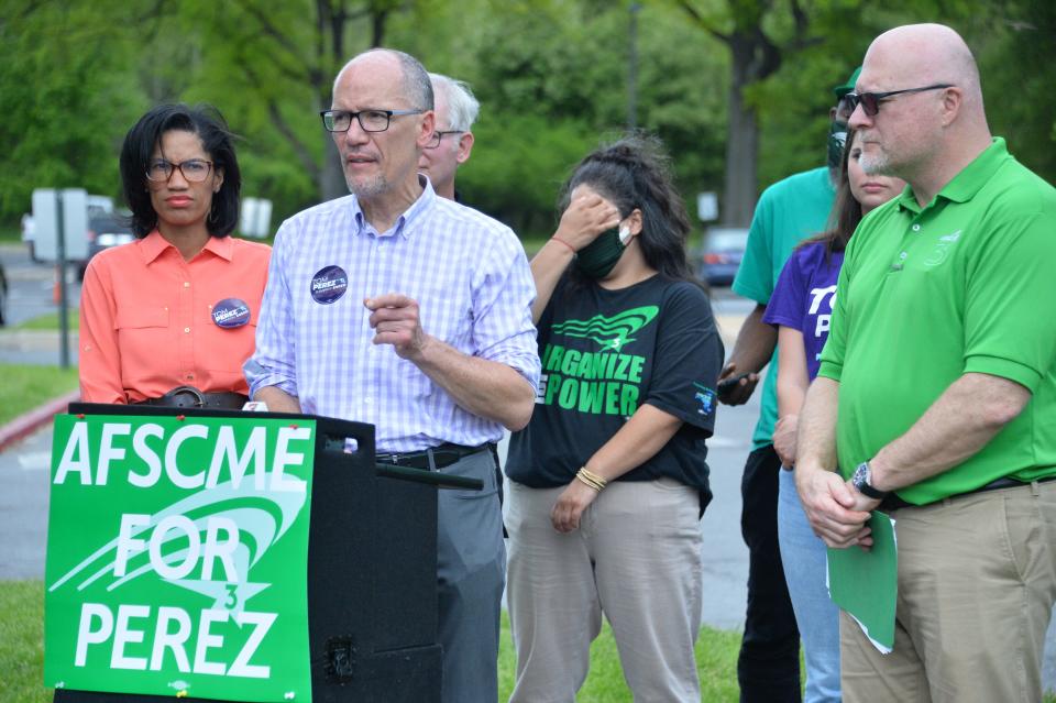 Former U.S. Labor Secretary and Democratic candidate for Maryland governor Tom Perez stands with running mate and former Baltimore City Councilwoman Shannon Seed, left, and AFSCME Council 3 President Patrick Moran, far right, outside of the Western Maryland Hospital Center in Hagerstown on Friday, May 13, 2022, to oppose the closure of the facility.