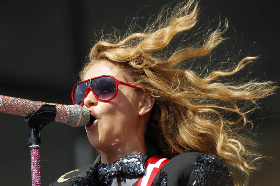 In this May 5, 2012 file photo, Paulina Rubio performs at the New Orleans Jazz and Heritage Festival in New Orleans. (AP Photo/Gerald Herbert, File)