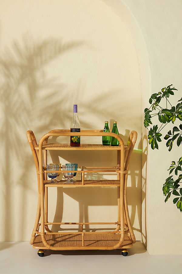 <p><a href="https://go.redirectingat.com?id=74968X1596630&url=https%3A%2F%2Fwww.anthropologie.com%2Fanthroliving%2Fshop%2Fedith-bar-cart%3Fcolor%3D014%26size%3DALL&sref=https%3A%2F%2Fwww.housebeautiful.com%2Fshopping%2Ffurniture%2Fa27043357%2Fbest-outdoor-furniture%2F" rel="nofollow noopener" target="_blank" data-ylk="slk:Shop Now;elm:context_link;itc:0;sec:content-canvas" class="link rapid-noclick-resp">Shop Now</a></p><p>Edith Bar Cart</p><p>anthropologie.com</p><p>$499.95</p>