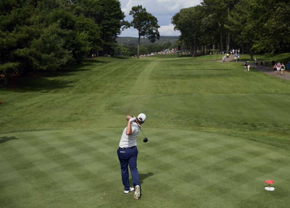 Zack Sucher hits off the 10th tee during the third round of the Travelers Championship golf tournament, Saturday, June 22, 2019, in Cromwell, Conn. Sucher hit a tree on his drive. (AP Photo/Jessica Hill)