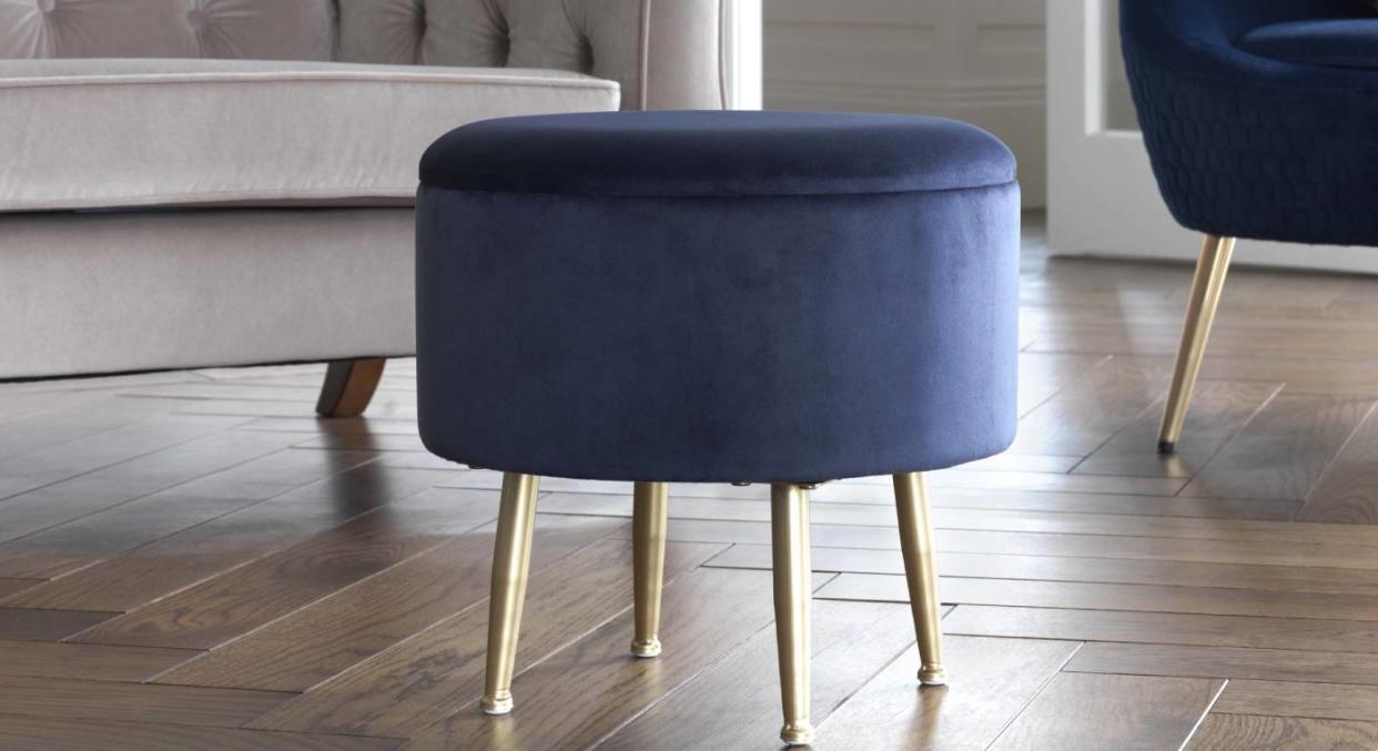 Argos is selling this luxury-looking velvet footstool for only £10. (Argos)