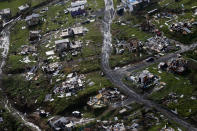 <p>Destroyed communities are seen in the aftermath of Hurricane Maria in Toa Alta, Puerto Rico, Thursday, Sept. 28, 2017. (Photo: Gerald Herbert/AP) </p>