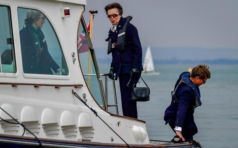 The Princess Royal arrives by boat to the Royal Victoria Yacht Club, on the Isle of Wight - PA
