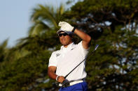 Hideki Matsuyama, of Japan, watches his shot from the 11th tee during the first round of the Sony Open golf tournament, Thursday, Jan. 13, 2022, at Waialae Country Club in Honolulu. (AP Photo/Matt York)