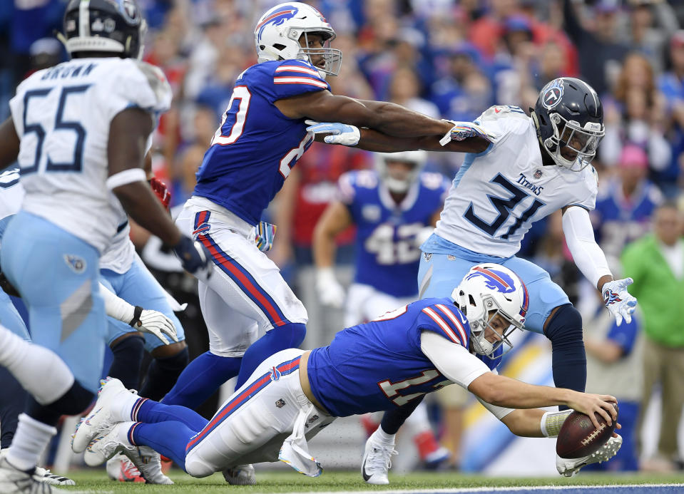 Buffalo Bills quarterback Josh Allen (17) dives in for a touchdown run against the Tennessee Titans during the first half of an NFL football game, Sunday, Oct. 7, 2018, in Orchard Park, N.Y. (AP Photo/Adrian Kraus)