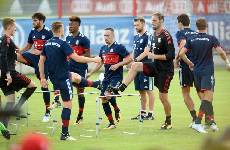 Bayern Munich's players warm up during a training session in Munich, on July 1, 2017