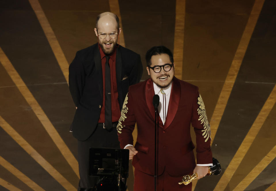 Daniel Scheinert and Dan Kwan accept the Best Director award for Everything Everywhere All at Once during the Academy Awards on March 12.