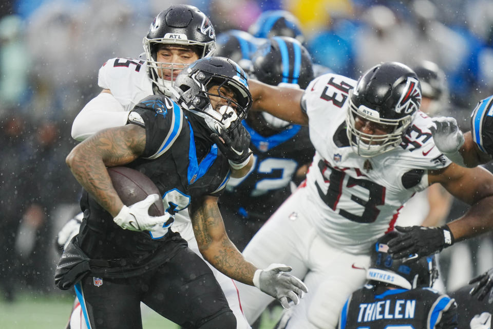 Carolina Panthers quarterback Bryce Young is tackled by Atlanta Falcons linebacker Kaden Elliss during the first half of an NFL football game Sunday, Dec. 17, 2023, in Charlotte, N.C. (AP Photo/Rusty Jones)