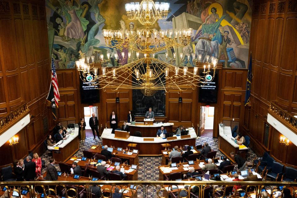 The Indiana House of Representatives begins session after a two-hour recess, Wednesday, March 6, 2024, at the Indiana Statehouse in Indianapolis.