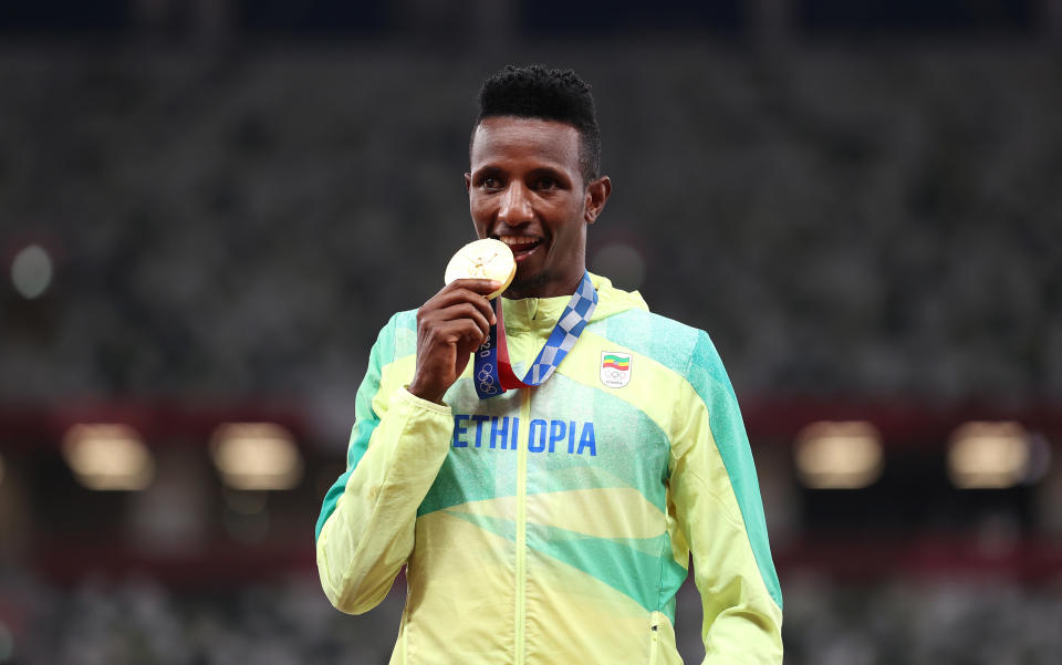 Selemon Barega of Team Ethiopia poses with his gold medal