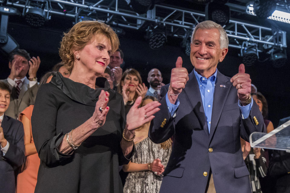 Louisiana Republican gubernatorial candidate Eddie Rispone gives the thumbs up next to his wife Linda Rispone after he addresses supporters at his election night watch party at L'Auberge Casino and Hotel in Baton Rouge, La., Saturday, Nov. 16, 2019. (AP Photo/Sophia Germer)