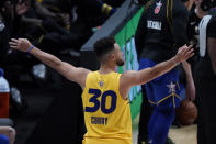 Golden State Warriors guard Stephen Curry celebrates during the 3-point contest at basketball's NBA All-Star Game in Atlanta, Sunday, March 7, 2021. (AP Photo/Brynn Anderson)