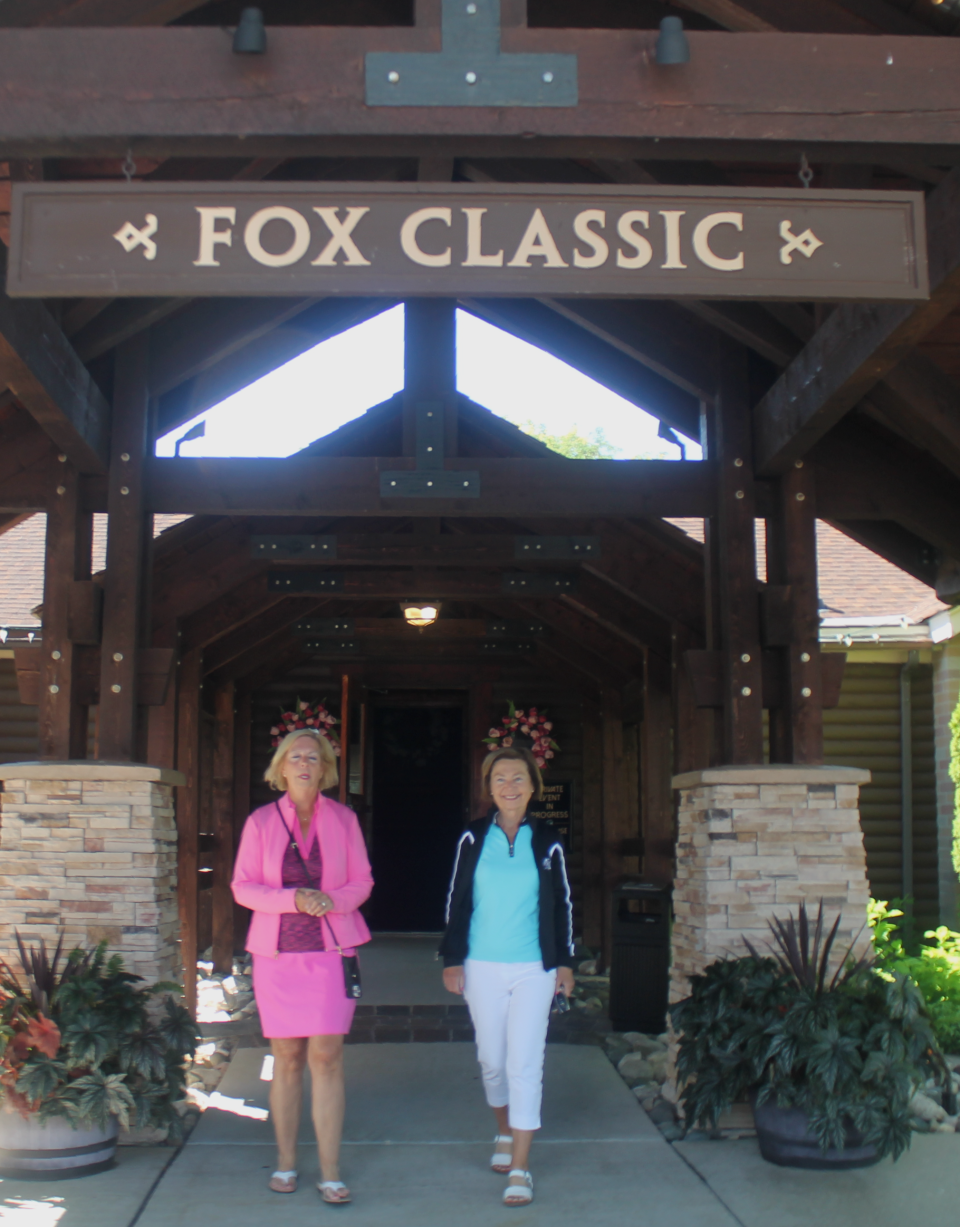 Kathy Aznavorian and Sandy Mily walk out of Fox Hills first clubhouse.