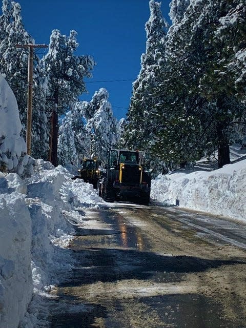 Caltrans crews have worked around the clock to clear snow from roadways in the San Bernardino Mountains.