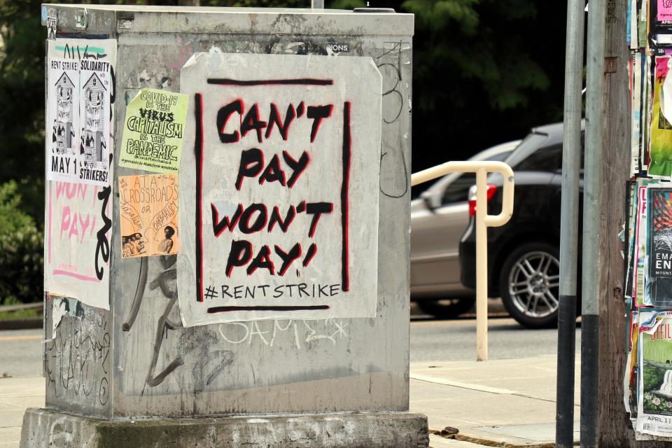 SEATTLE, UNITED STATES - APRIL 30, 2020: A utility box in Seattle's Capitol Hill neighbourhood is covered in graffiti and posters calling for a rent strike. Thousands of residential tenants in several American cities have pledged to stop paying rent in what has been described as the largest planned "rent strike" in the United States in decades.- PHOTOGRAPH BY Toby Scott / Echoes Wire/ Barcroft Studios / Future Publishing (Photo credit should read Toby Scott / Echoes Wire/Barcroft Media via Getty Images)