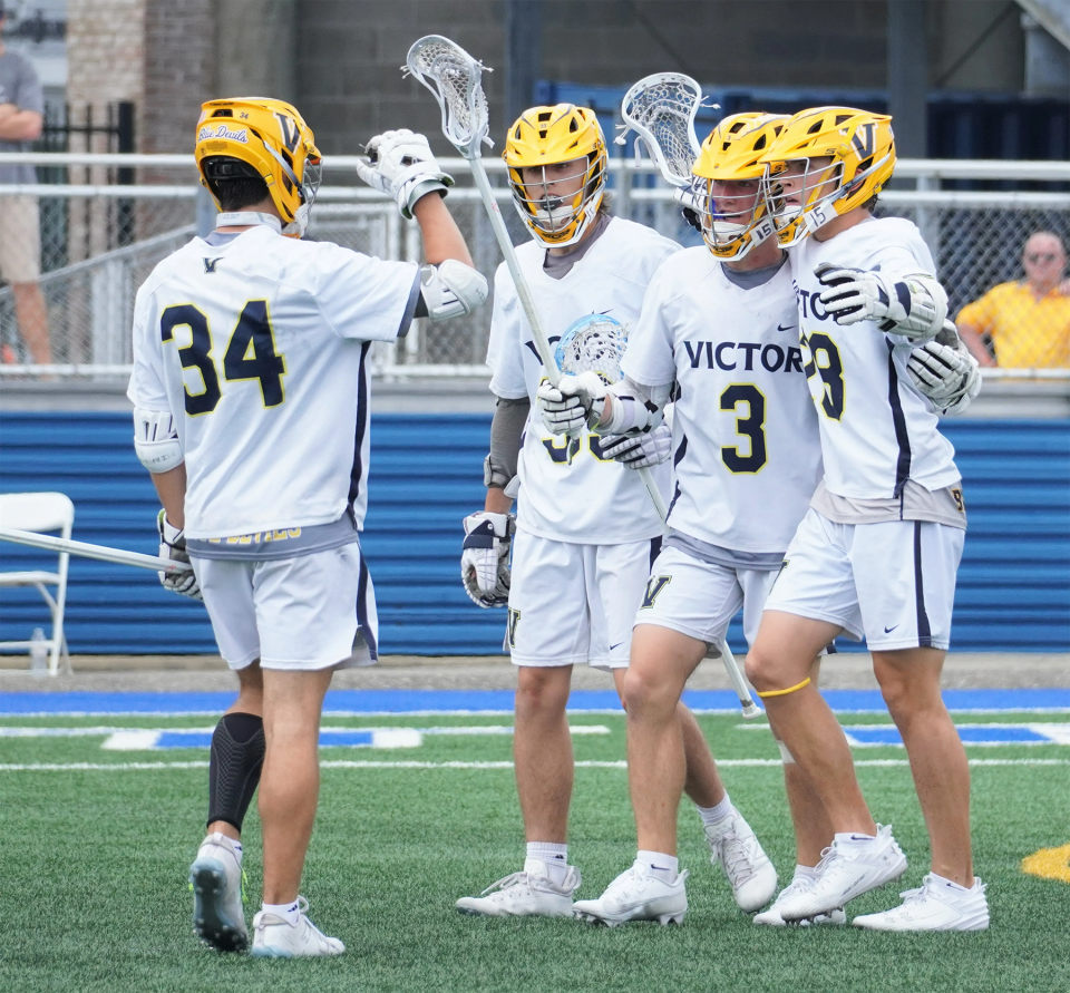 Victor celebrates a late goal during a 9-8 loss to Garden City in the NYSPHSAA Class B championship game at Hofstra University on June 11, 2023.