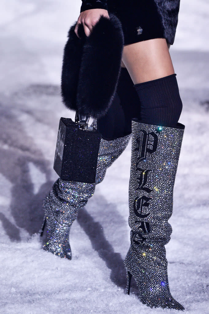 <p>A close-up of Plein’s boots that resemble Saint Laurent’s version in 2017. (Photo: Getty) </p>