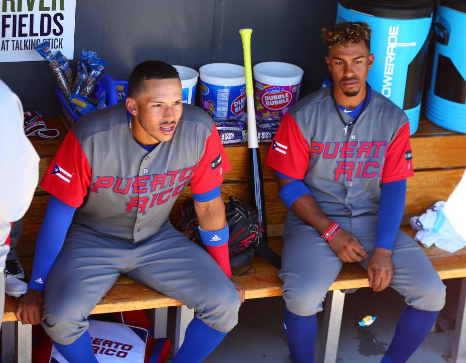 Carlos Correa and Francisco Lindor playing for Puerto Rico in 2017.