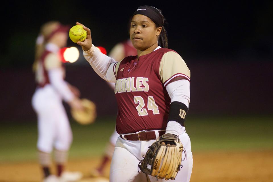 Florida High senior Jaysoni Beachum (24) throws the ball in between innings in a game between Florida High and Chiles on March 20, 2023, at Chiles High School. The Seminoles won, 11-2.