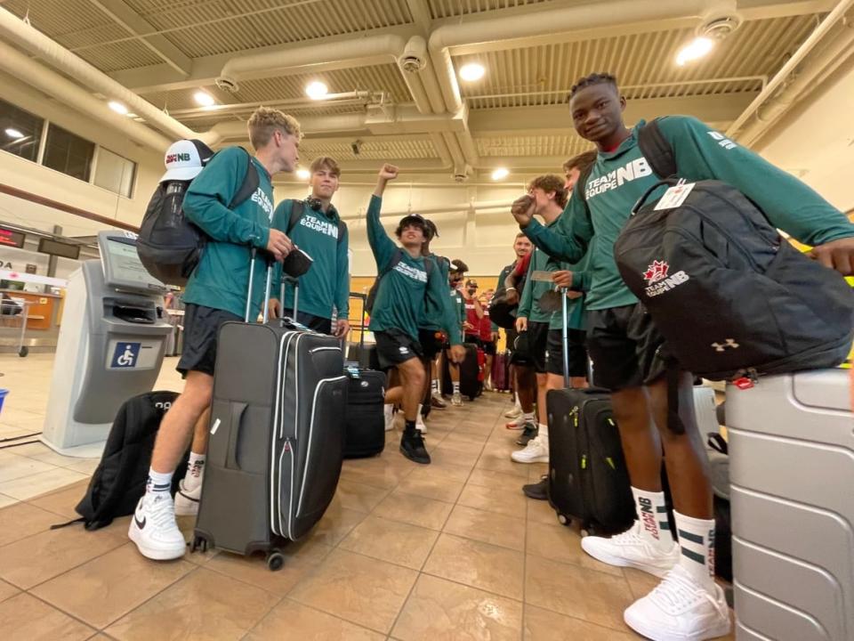 Team New Brunswick athletes departed for the 2022 Canada Summer Games from the Moncton airport Friday morning. (Alexandre Silberman/CBC - image credit)