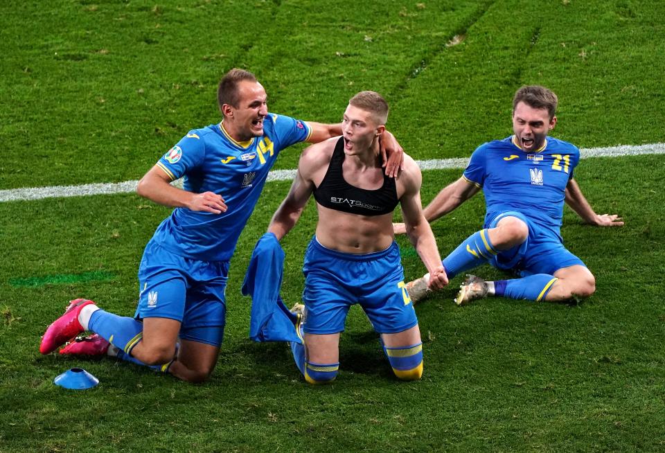 Artem Dovbyk, centre, scored a stoppage-time winner in extra-time to set up the quarter-final with England (PA Wire)