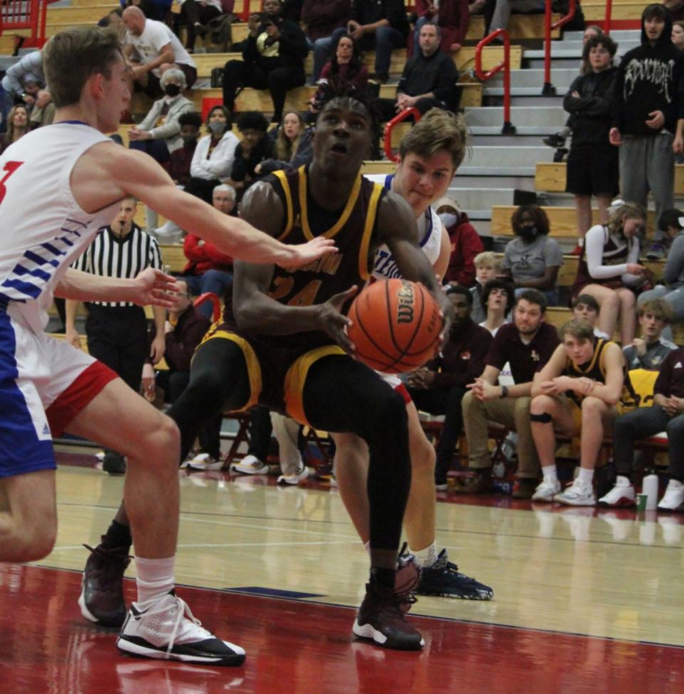 Bloomington North junior JaQualon Roberts works under the basket during Friday's game at Martinsville.