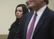 Kimberly Arendt, left, one of the defendants in the Holland Tunnel weapons case, along with John Cramsey and Dean Smith appear before Hudson County Superior Court Judge Mitzy Galis-Menendez in Jersey City, N.J., where they are facing weapons possession charges. (Ed Murray/NJ Advance Media via AP, Pool)