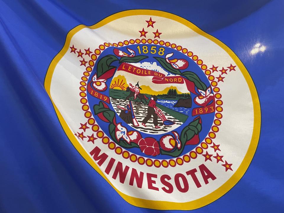 The Minnesota state flag is displayed in the state Capitol building rotunda, March 24, 2022, in St. Paul, Minn. 