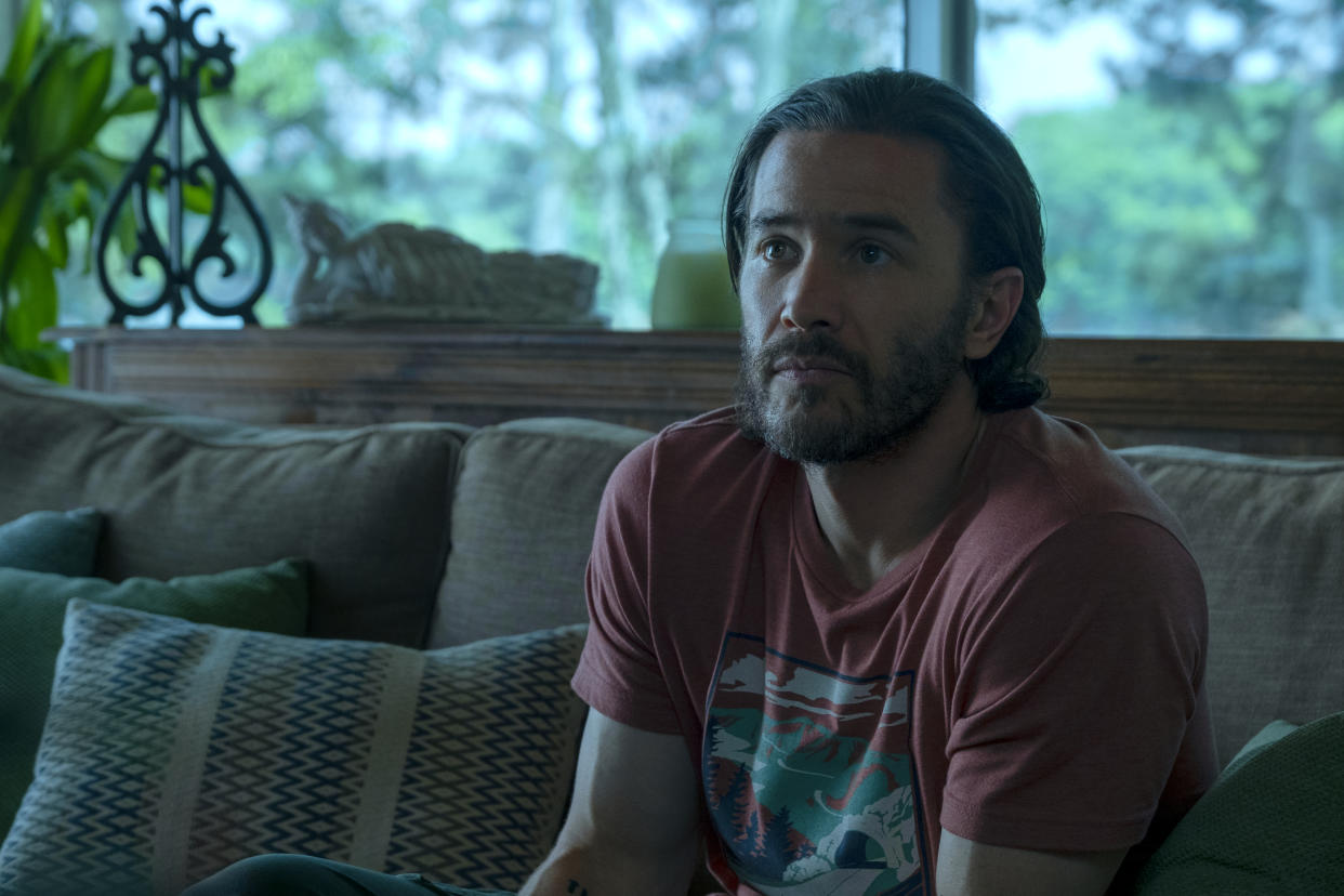 This image released by Netflix shows Tom Pelphrey in a scene from "Ozark." This month “Ozark” will drop its final seven episodes of the series, wrapping up the story of a couple whose family moves to Missouri and descends deeper and deeper into a life of money laundering, drugs and murder. (Steve Dietl/Netflix via AP)