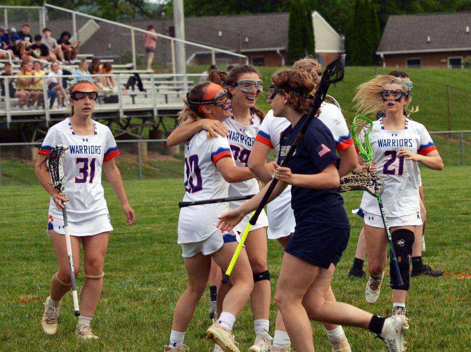 Boonsboro players celebrate after scoring a goal in the first half during their 15-6 win over Perryville in the Maryland Class 1A state quarterfinals.