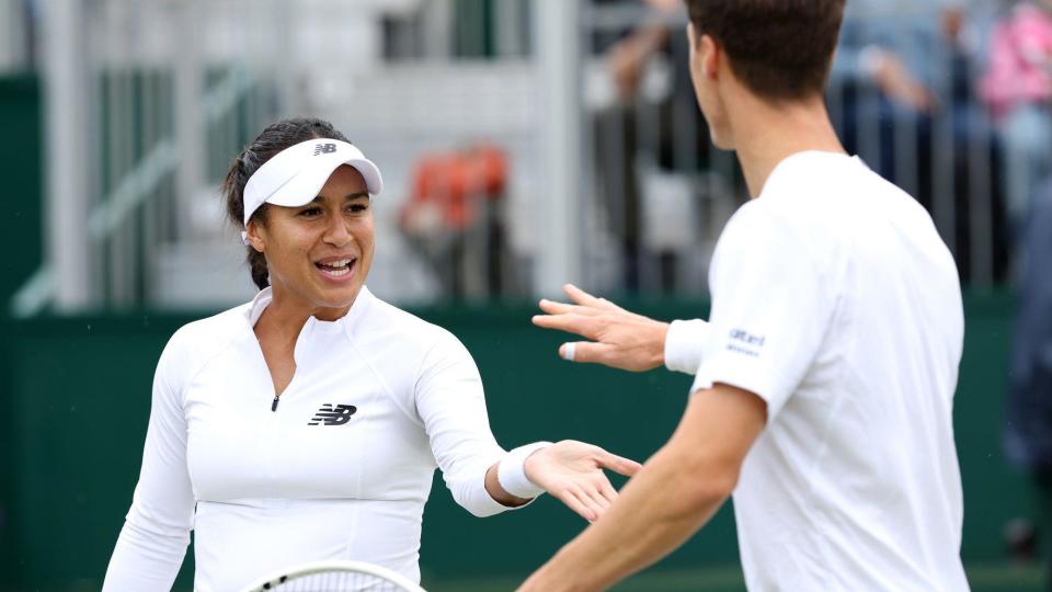 Heather Watson and Joe Salisbury give each other a high five