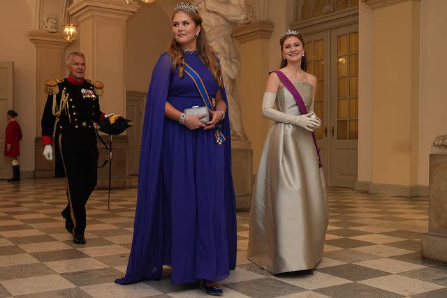 <p>MADS CLAUS RASMUSSEN/Ritzau Scanpix/AFP via Getty Images</p> Princess Catharina-Amalia of the Netherlands and Princess Elisabeth of Belgium enter Prince Christian's birthday gala on October 15.