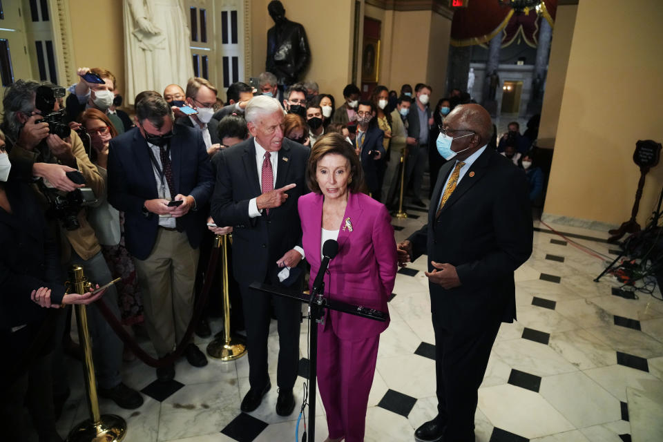 UNITED STATES - NOVEMBER 05: Speaker of the House Nancy Pelosi, D-Calif., House Majority Leader Steny Hoyer, D-Md., left, and House Majority Whip Jim Clyburn, D-S.C., conduct a news conference on plans to move forward with the Build Back Better Act and the infrastructure bill in the U.S. Capitol on Friday, November 5, 2021. (Photo By Tom Williams/CQ-Roll Call, Inc via Getty Images)