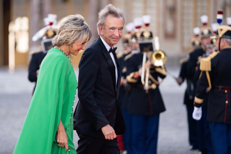 Bernard Arnault and his wife Helene Mercier arrive at the Chateau de Versailles on Sept. 20.