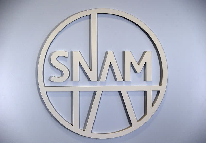 FILE PHOTO: Italian gas transport group Snam logo is seen at the headquater in San Donato Milanese