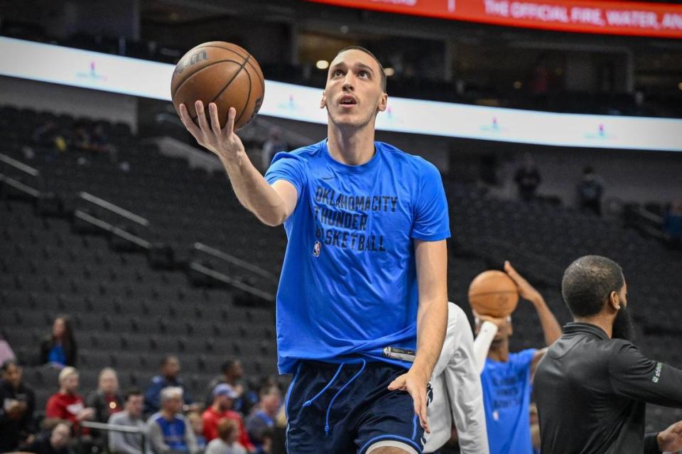 Aleksej Pokusevski warms up before the game between the Dallas Mavericks and the Oklahoma City Thunder at the American Airlines Center. The Hornets signed the free agent forward on Wednesday.
