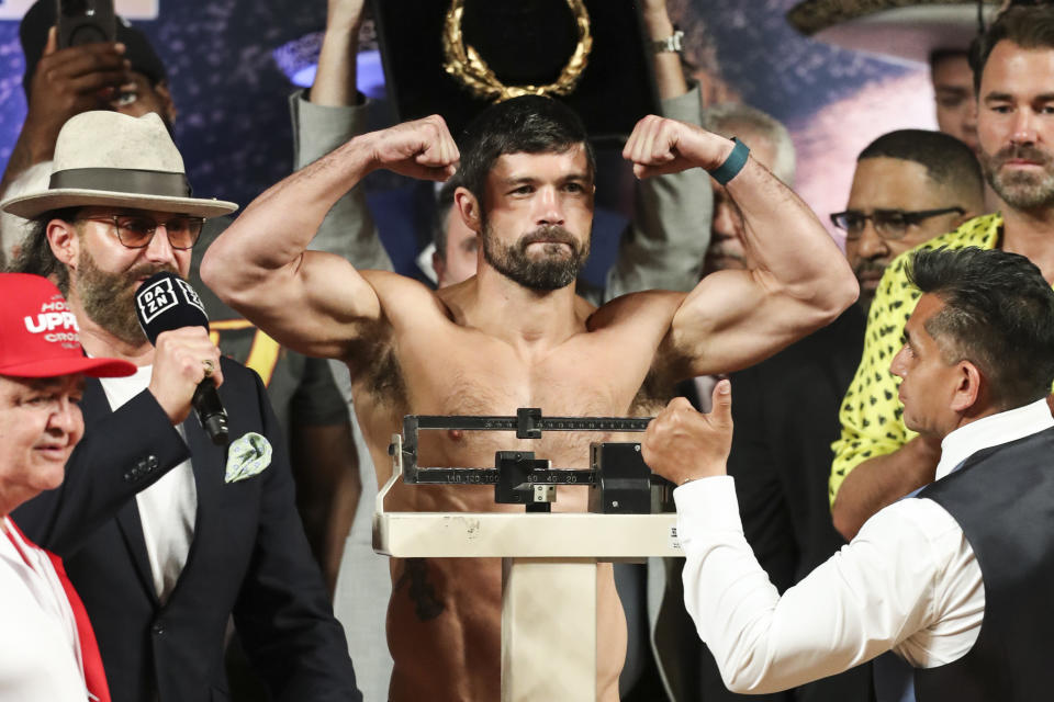 John Ryder of Britain attends his weigh-in ceremony in Guadalajara, Mexico, Friday, May 5, 2023. Ryder and Mexican Saul "Canelo" Alvarez will meet for a super middleweight championship fight at Akron Stadium on May 6. (AP Photo/Refugio Ruiz)