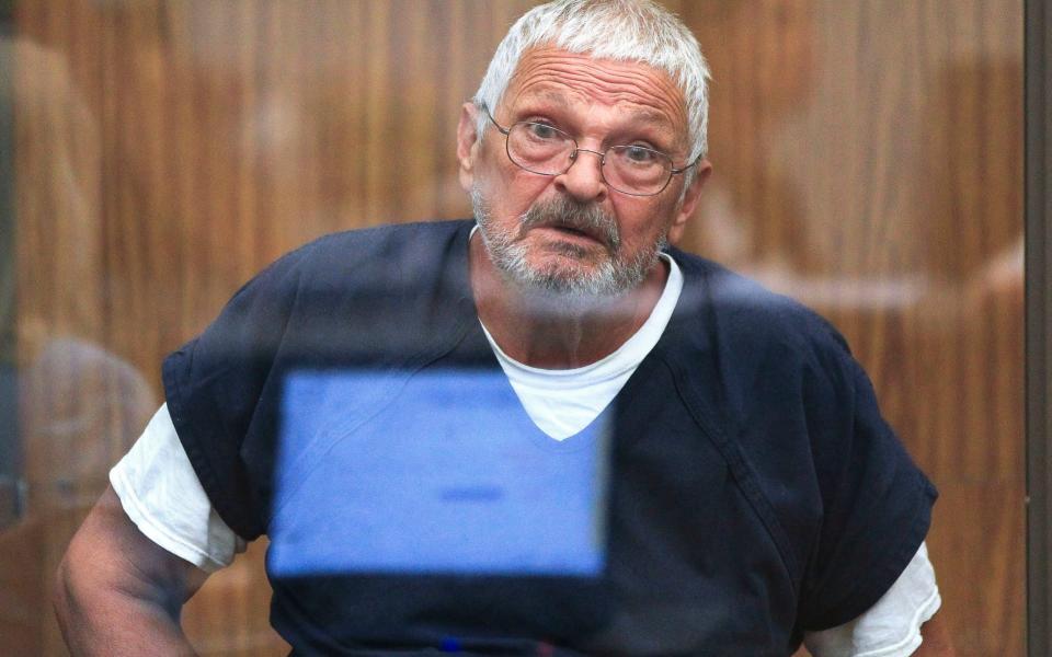 Nikolaos Philippoussis, the father of retired Australian tennis star Mark Philippoussis, listens during his arraignment at the Vista Courthouse in Vista, California - The San Diego Union-Tribune