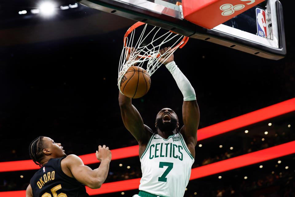 Jaylen Brown dunks against the Cleveland Cavaliers.