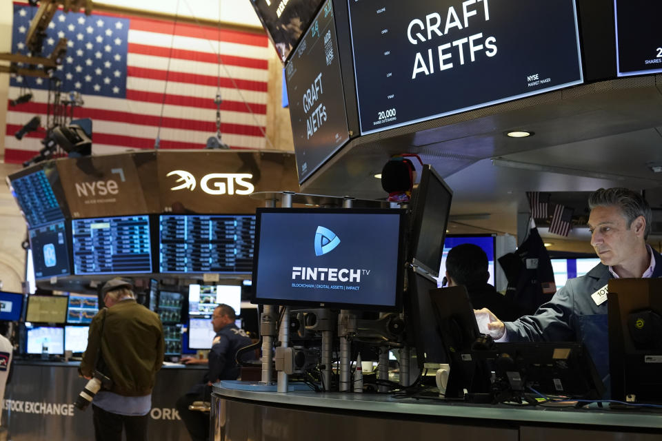 Traders work on the floor at the New York Stock Exchange in New York, Thursday, May 25, 2023. (AP Photo/Seth Wenig)