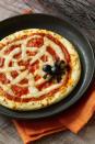 <p>Serve up a piping hot slice of spookiness with these <a href="https://www.womansday.com/food-recipes/food-drinks/g24/10-pizza-recipes-pizzazz-62794/" rel="nofollow noopener" target="_blank" data-ylk="slk:super-simple pizzas;elm:context_link;itc:0;sec:content-canvas" class="link ">super-simple pizzas</a> and a black olive spider.</p><p><strong><em><a href="https://www.womansday.com/food-recipes/food-drinks/recipes/a10838/spiderweb-pizzas-recipe-122166/" rel="nofollow noopener" target="_blank" data-ylk="slk:Get the Spiderweb Pizza recipe.;elm:context_link;itc:0;sec:content-canvas" class="link ">Get the Spiderweb Pizza recipe. </a></em></strong></p>