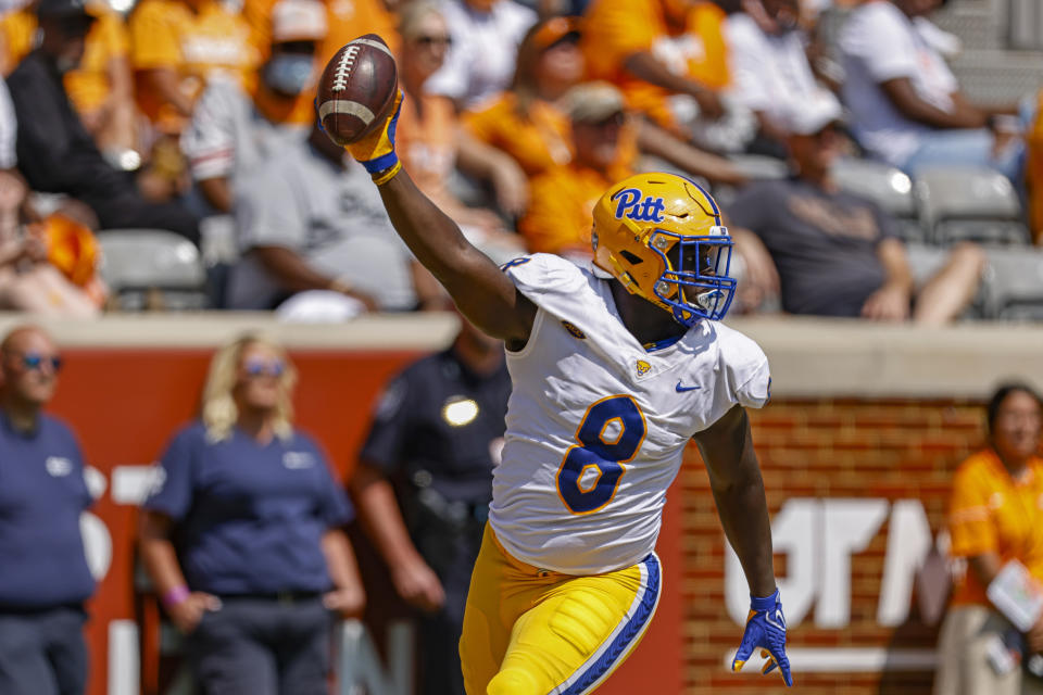 Pittsburgh quarterback Kenny Pickett (8) celebrates a touchdown catch during the first half of an NCAA college football game against Tennessee, Saturday, Sept. 11, 2021, in Knoxville, Tenn. (AP Photo/Wade Payne)