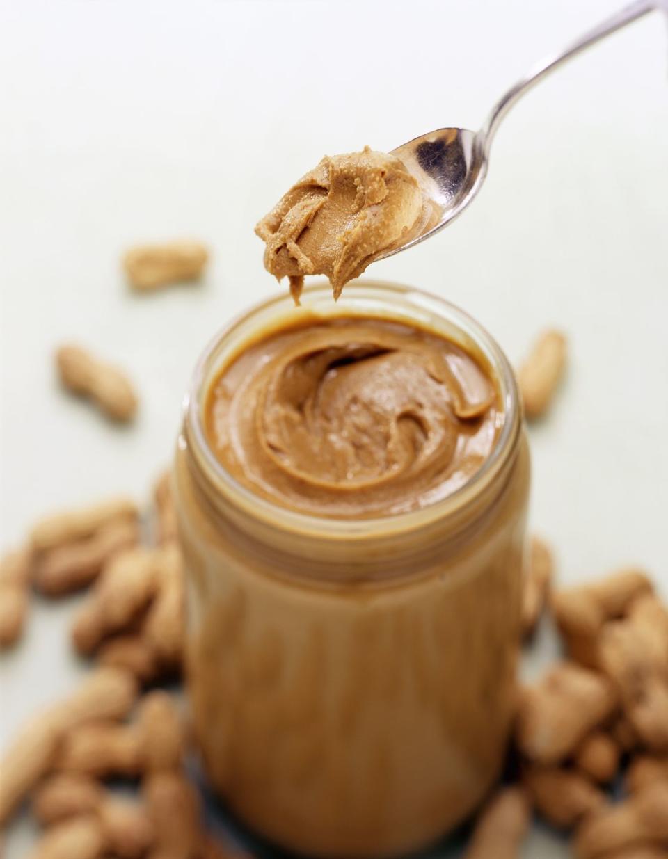 <p>Read the ingredients: Does yours say "cane sugar, "honey" or even "corn syrup"? Opt for natural brands <a href="https://www.goodhousekeeping.com/health/diet-nutrition/a26866/health-benefits-peanut-butter/" rel="nofollow noopener" target="_blank" data-ylk="slk:made only with nuts;elm:context_link;itc:0;sec:content-canvas" class="link ">made only with nuts</a>.</p>