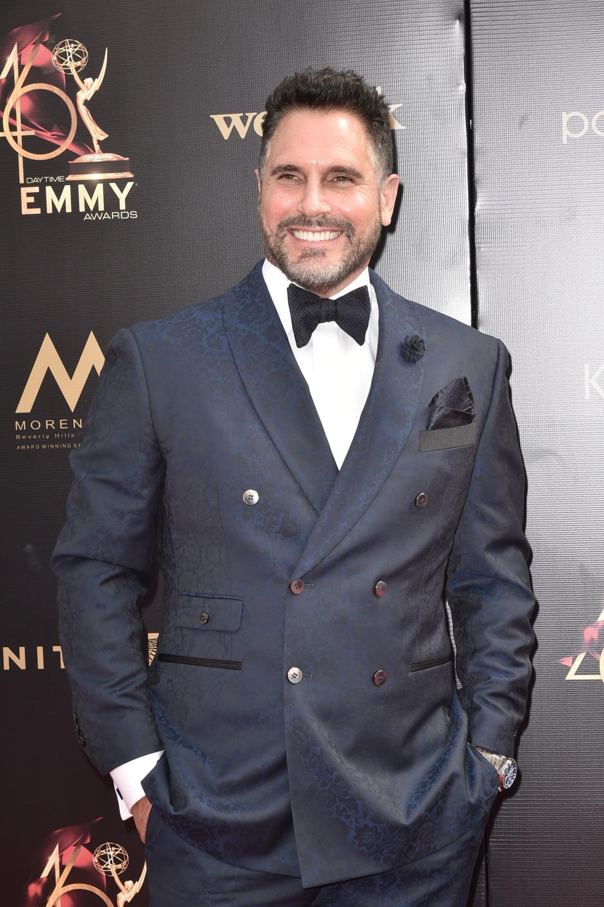 Don Diamont looks stunning in a two-piece blue suit, with a dazzling smile on his face